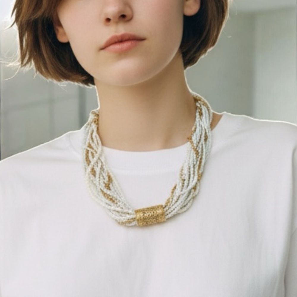 Elegant Gold and White Beaded Necklace 1928 branded